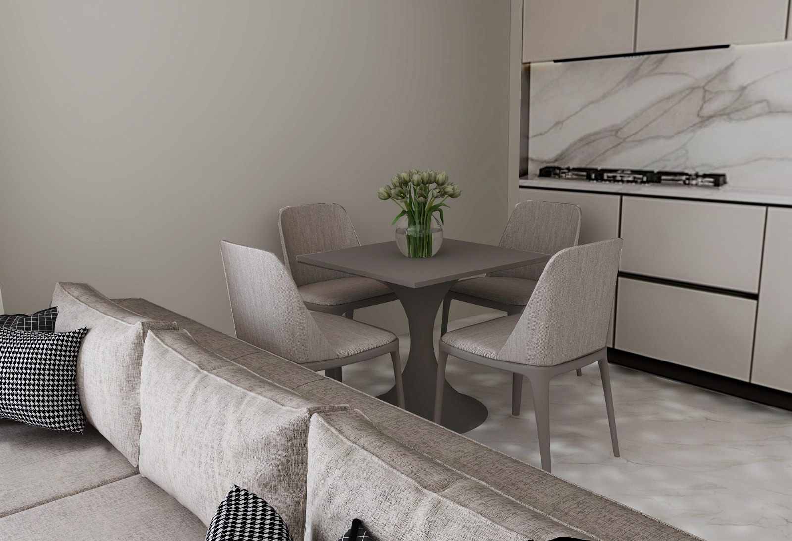 Dining area and kitchen of a one-bedroom apartment at Sella Residences